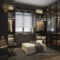 open wardrobe with wooden closet in bedroom